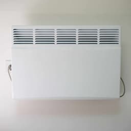 Installation of wall-mounted convector stoves