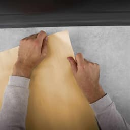 Foil wrapping on furniture panels