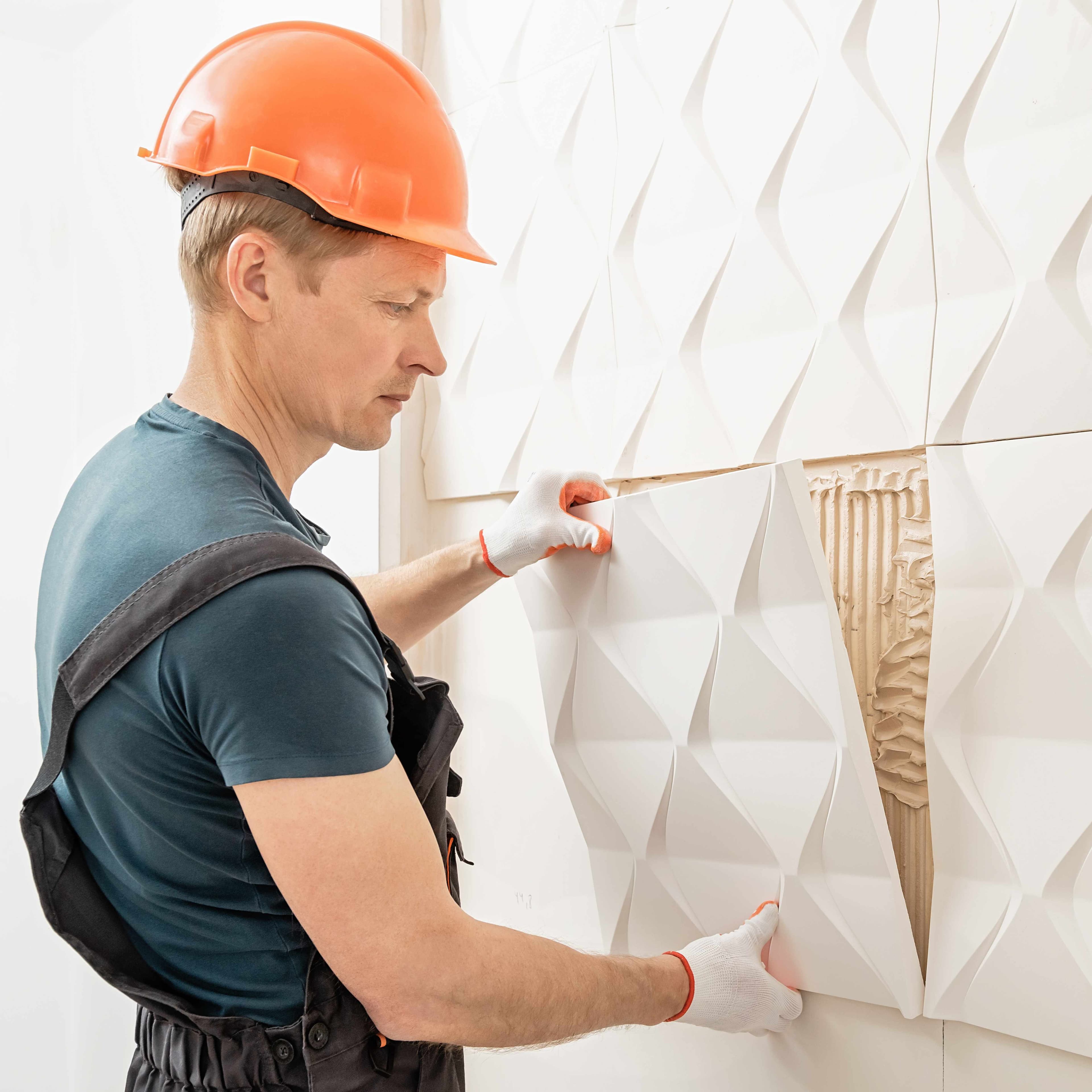 Pose de revêtements muraux en granit et faïence